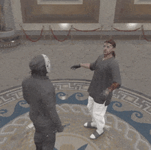 two men standing in a room with a greek key pattern