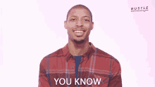 a man wearing a plaid shirt says you know