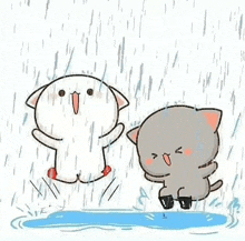 two cartoon cats are jumping in the rain and playing in a puddle .