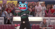 a picture of a mascot with brett written on the bottom left