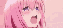 a close up of a pink anime girl with purple eyes .