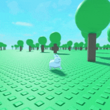 a white rabbit in a green field with trees