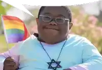 a man wearing glasses and a star necklace is holding a small rainbow flag