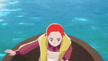 a girl with red hair is sitting in a boat in the ocean