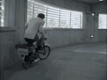 Hasselhoff Moped Rider GIF