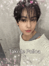 a picture of a boy with the words taki de polloa written on it