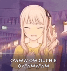 a girl in a yellow shirt is crying with her eyes closed and says owww ow ouchie owwwwww .