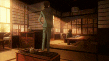 a man in a suit is standing in a room with sliding glass doors