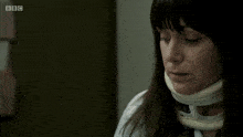 a woman with a neck brace is on bbc