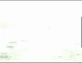 a man riding a bike on a muddy road