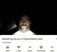 a man with glasses is dissolving his cock in hydrochloric acid .