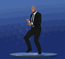 a statue of a man in a suit and tie pointing