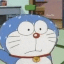 a close up of a cartoon character making a funny face .