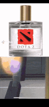 a bottle of perfume that says dota 2 on the front