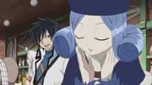 a girl with blue hair is standing next to a man with black hair