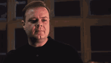 a man with a speech bubble that says perfection in front of him