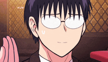 a man wearing glasses and a suit has a u on his face