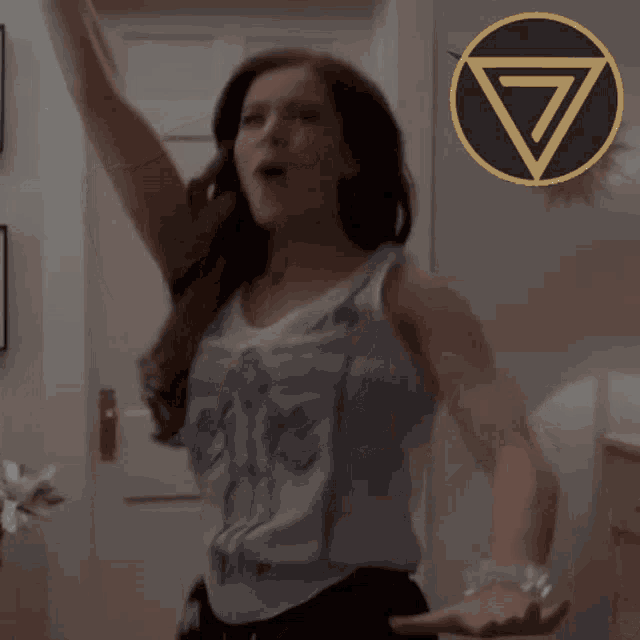 a woman in a tank top with the word lfg written on it