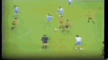 a blurry video of a soccer game being played