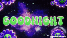 the word goodnight is surrounded by purple flowers on a dark background