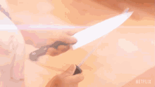 Sharpening The Knife Pressure Cooker GIF - Sharpening The Knife Pressure Cooker Whetting The Knife GIFs