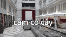 a large room with the words cam co day written on the floor