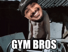 a shirtless man is lifting a barbell with the words gym bros above him