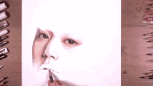 a drawing of a woman 's face with a pencil in her mouth