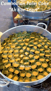 a bowl of cambodian palm cake is being cooked in a pan