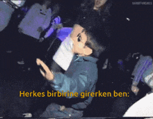 a pixelated image of a boy dancing with the words herkes birbirine girerken ben