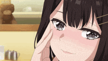 a close up of a girl 's face with a teddy bear in the background and the word mods visible