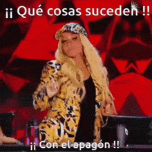 a woman is dancing in front of a red background with the words ii que cosas suceden !!