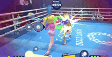 a video game is being played in a boxing ring with the tokyo 2020 logo on the floor