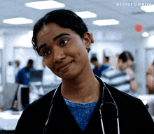 a female doctor with a stethoscope around her neck looks at the camera with the caption bestofsupriya