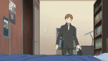 a man in a suit is standing in a room with a poster on the wall that says ' tokyo '