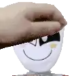 a person is touching a stuffed animal 's face .
