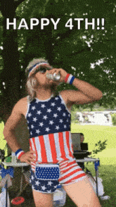 a man in an american flag outfit is drinking a beer .