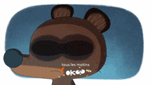 a cartoon drawing of a bear with the words tous les matins on its face
