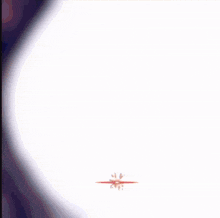a blurred image of a person 's face with a red star in the center