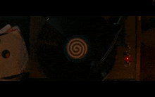 a record on a turntable has a spiral on it