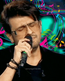 a man wearing glasses is singing into a microphone in front of music notes