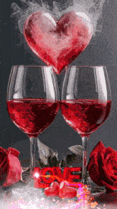 two glasses of red wine with a heart shaped smoke coming out of it