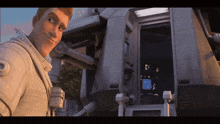 a man in a space suit is smiling in front of a door that says a on it