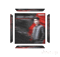 a blurred image of a man in a red jacket and tie