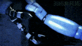 a close up of a robot 's arm with the words bonbon films written on the bottom .