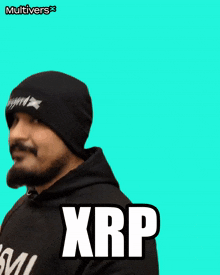 a man with a beard wearing a beanie and a hoodie with xrp written on it