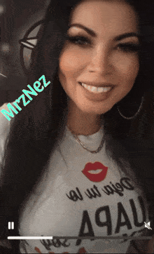 a woman wearing a t-shirt that says " a9au " smiles for the camera