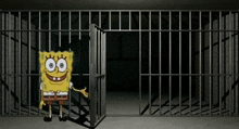 spongebob is smiling in a jail cell