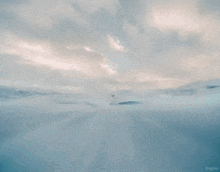 a man in a superman costume is flying in the sky