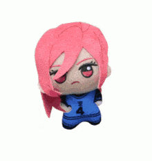 a stuffed doll with pink hair and the number 4 on her shirt
